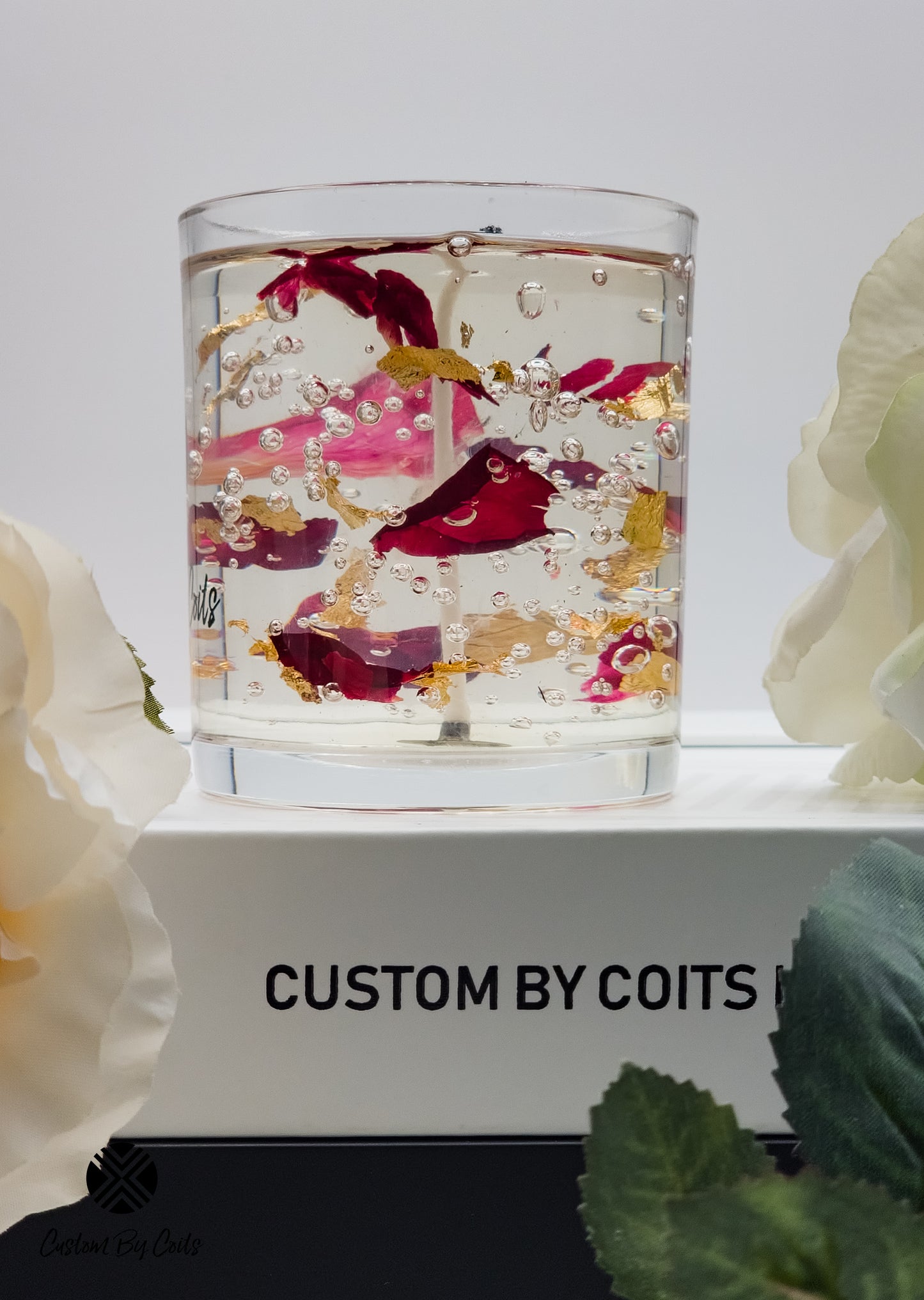 Petals and Gold Clear Candle by Custom By Coits, with real rose petals and gold flakes, lavender and amber scent, in gift box.